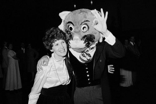Patricia T. Holland poses with Cosmo. Photo by BYU Magazine.