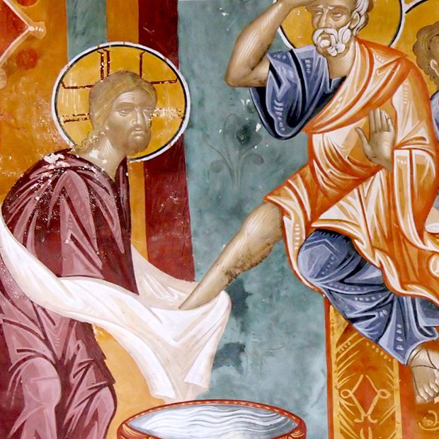 Painting of Jesus Christ Washing a Man's Feet. Christ is serving others, which is one way to be a disciple of Jesus Christ.