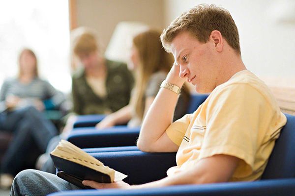 Man reading the scriptures