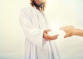 Jesus Christ taking a person's outstretched hand